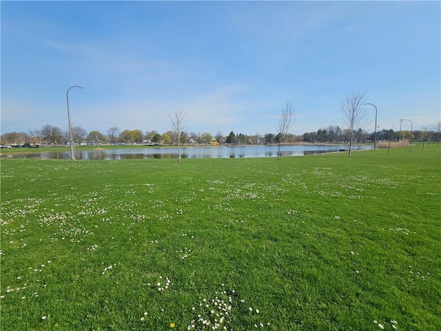 view of yard with a water view