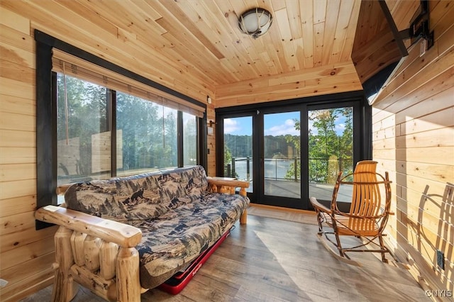 42795 Paynes Lake Camp Rd, Antwerp, NY 13608 - sunroom with wooden walls, wood finished floors, wooden ceiling, and french doors