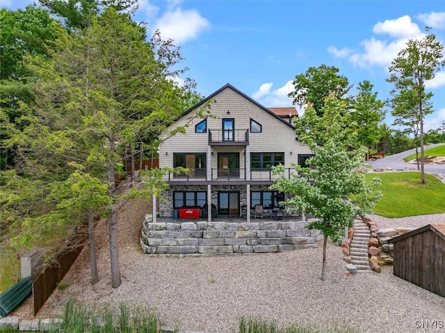 42795 Paynes Lake Camp Rd, Antwerp, NY 13608 - rear view of property featuring a patio and a balcony