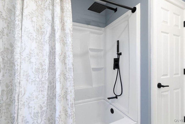 full bathroom with shower / bath combo