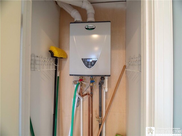 utility room with water heater