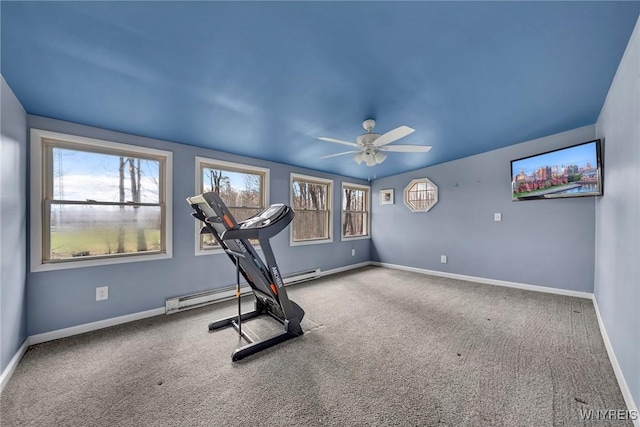 workout area with carpet floors, ceiling fan, and a healthy amount of sunlight