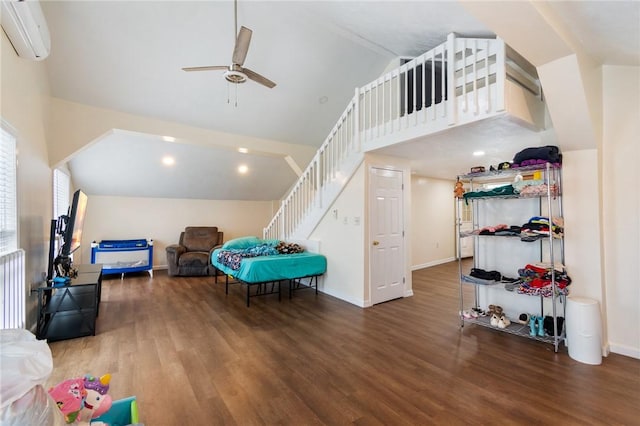game room featuring high vaulted ceiling, a ceiling fan, wood finished floors, a wall mounted AC, and baseboards