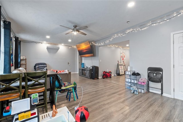 game room with recessed lighting, wood finished floors, baseboards, and ceiling fan