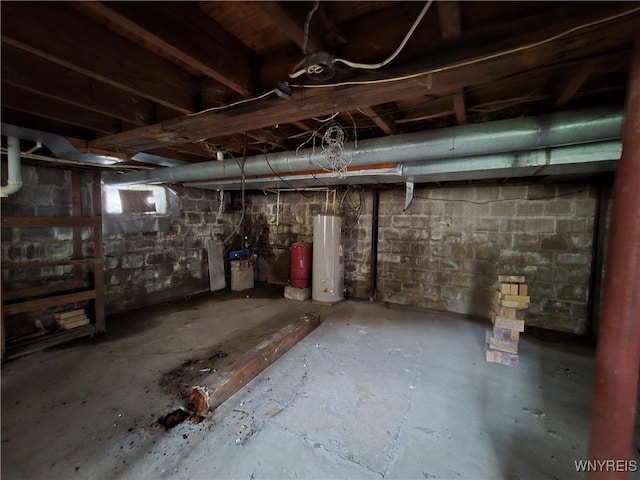 unfinished basement with gas water heater