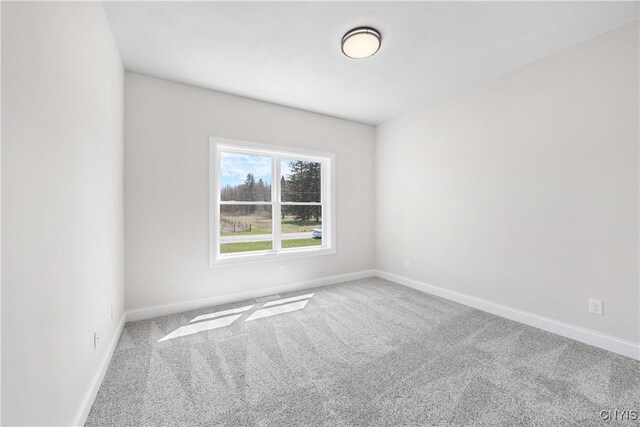 7717 Roberts St, Lenox, NY 13032 - spare room featuring baseboards and carpet flooring