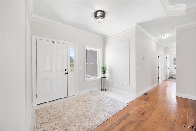 7717 Roberts St, Lenox, NY 13032 - entryway with hardwood / wood-style flooring, baseboards, and crown molding