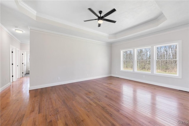7717 Roberts St, Lenox, NY 13032 - unfurnished room with a tray ceiling, a ceiling fan, and ornamental molding