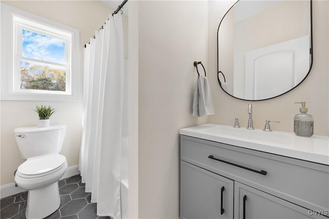 7717 Roberts St, Lenox, NY 13032 - full bathroom with tile patterned floors, toilet, vanity, baseboards, and a shower with shower curtain