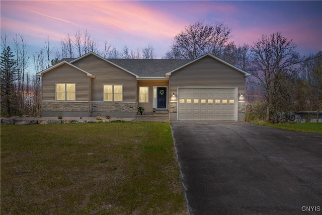 7717 Roberts St, Lenox, NY 13032 - ranch-style home featuring a lawn, aphalt driveway, stone siding, and a garage