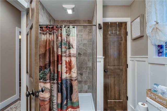 5410 N Shore Rd, Greig, NY 13312 - full bathroom featuring a shower stall and wainscoting