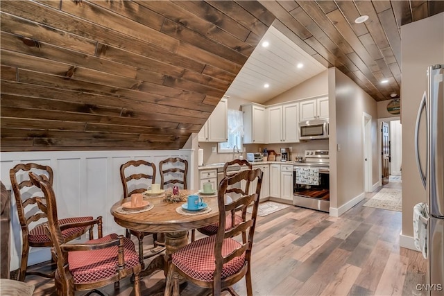 5410 N Shore Rd, Greig, NY 13312 - dining area with recessed lighting, lofted ceiling, wood finished floors, wooden ceiling, and baseboards