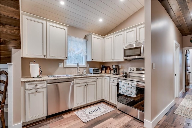 5410 N Shore Rd, Greig, NY 13312 - kitchen with recessed lighting, stainless steel appliances, a sink, light wood-type flooring, and wood ceiling