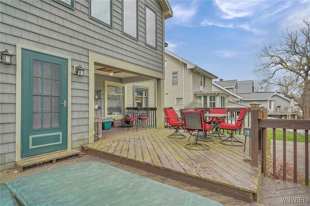 deck with outdoor dining space