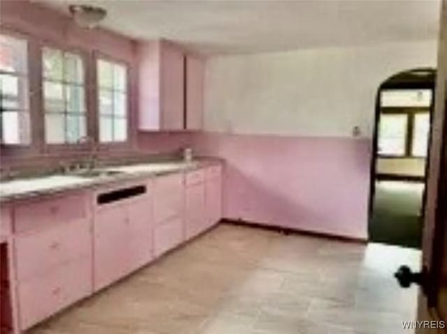 kitchen with arched walkways
