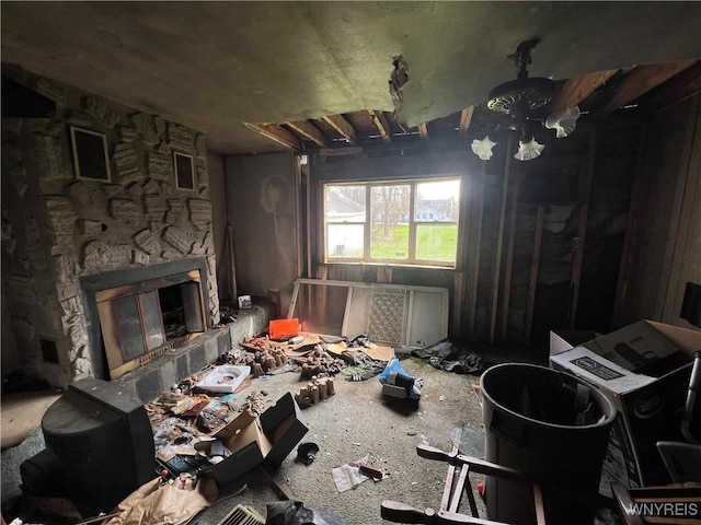 interior space featuring a stone fireplace