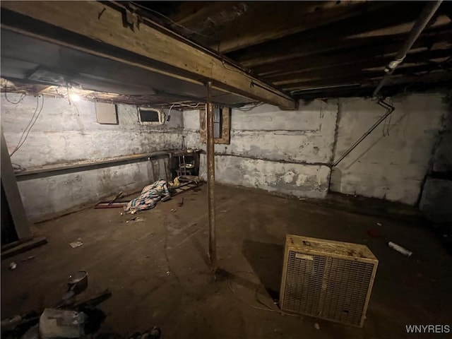unfinished basement featuring visible vents