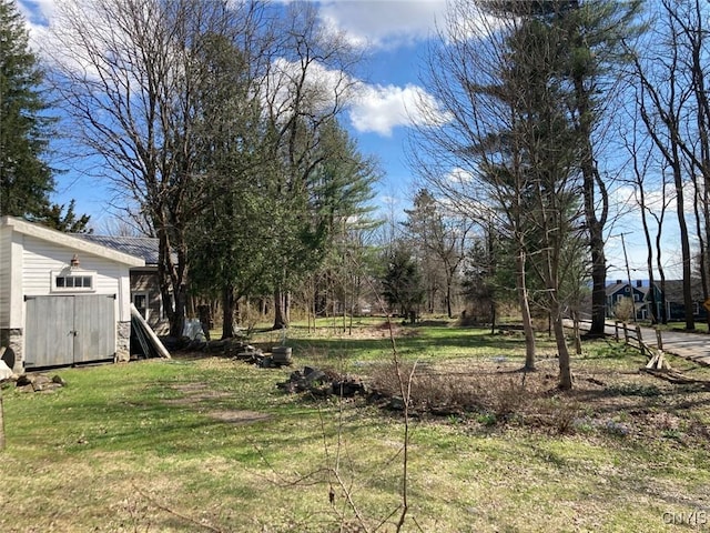 5081 Military Rd, Russia, NY 13431 - view of yard with an outbuilding and a storage unit