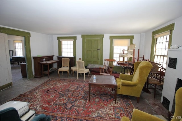 5081 Military Rd, Russia, NY 13431 - living room featuring a wealth of natural light and a fireplace
