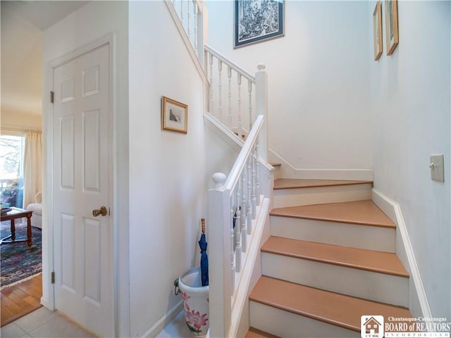 stairway with baseboards