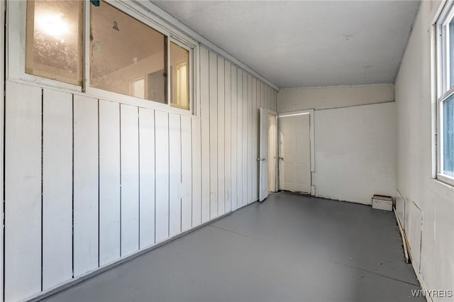 spare room with finished concrete floors