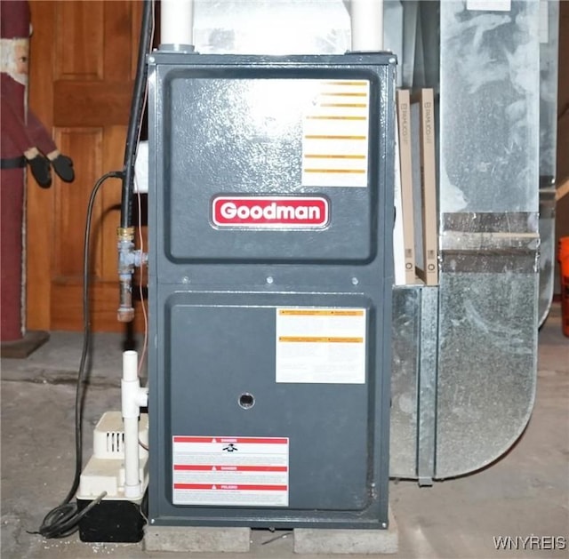 utility room with heating unit