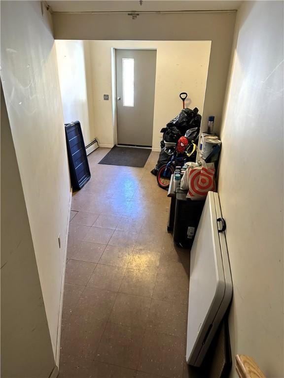 entryway featuring baseboard heating