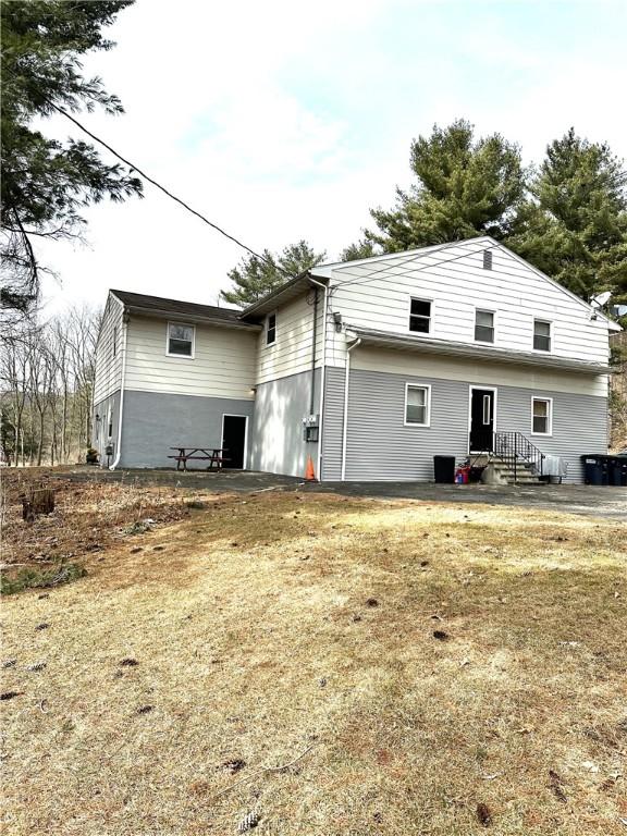 back of property with entry steps