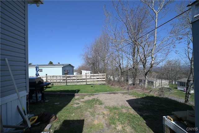 view of yard with fence