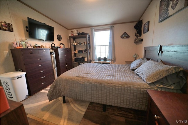 bedroom with crown molding