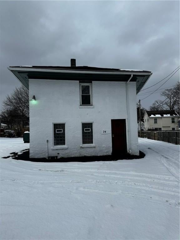 74 Melody St, Rochester, NY 14608 - snow covered property featuring fence