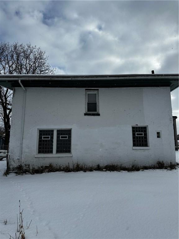 74 Melody St, Rochester, NY 14608 - view of snow covered exterior