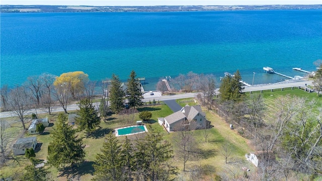 birds eye view of property featuring a water view
