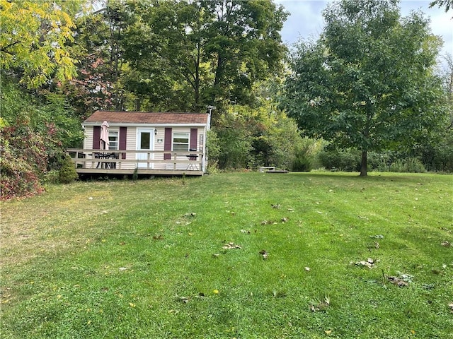 view of yard with a deck