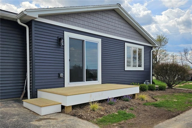view of home's exterior with a deck