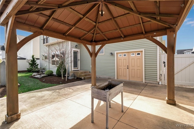 view of patio / terrace featuring a gazebo and fence