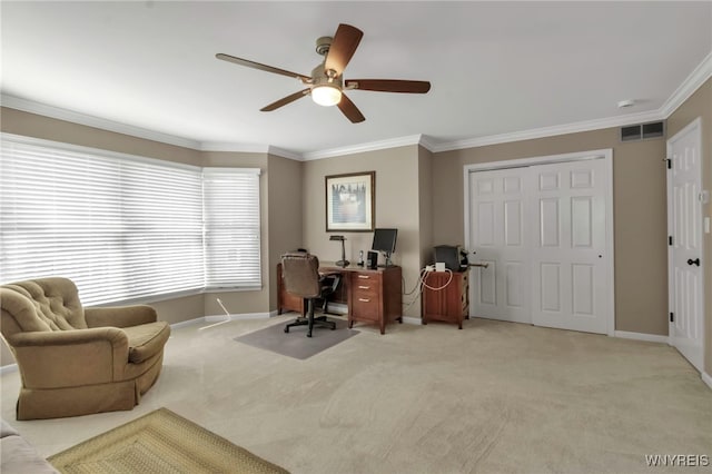 office with crown molding, visible vents, light carpet, and baseboards