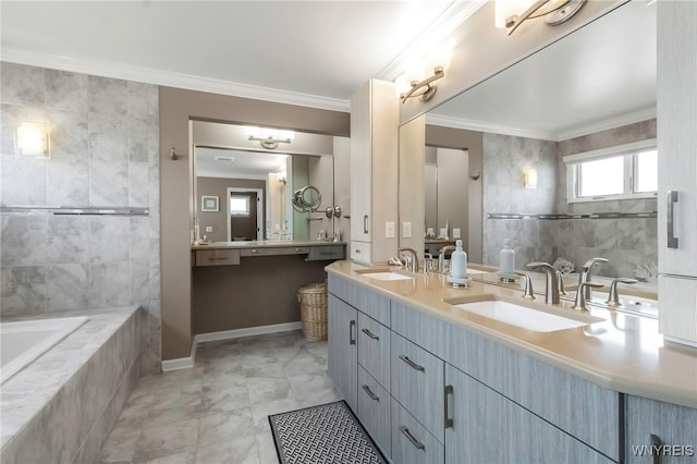 bathroom with ornamental molding, a sink, and tiled tub