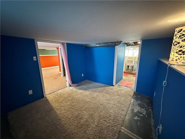 unfurnished bedroom with carpet floors