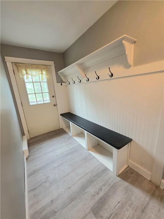 mudroom with wood finished floors