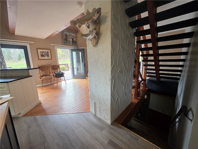 interior space with wood finished floors and plenty of natural light