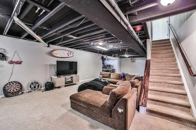 living area featuring stairway, baseboards, and carpet