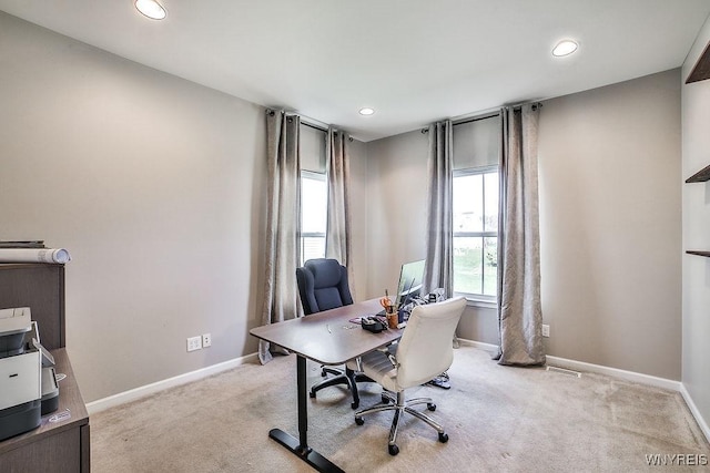 home office with recessed lighting, baseboards, visible vents, and light colored carpet