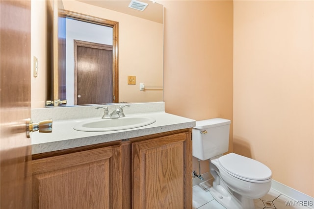 half bathroom featuring visible vents, baseboards, toilet, vanity, and tile patterned flooring