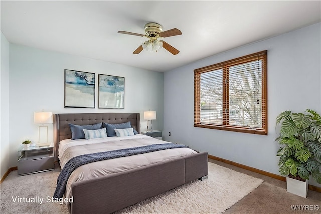 bedroom featuring baseboards, a ceiling fan, and carpet floors