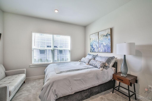carpeted bedroom with baseboards and recessed lighting