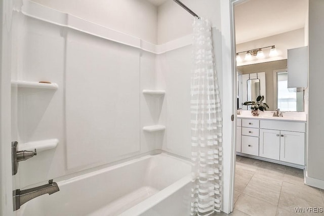 full bathroom with shower / bath combo with shower curtain, tile patterned flooring, and vanity