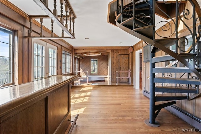 interior space with wood walls and wood finished floors