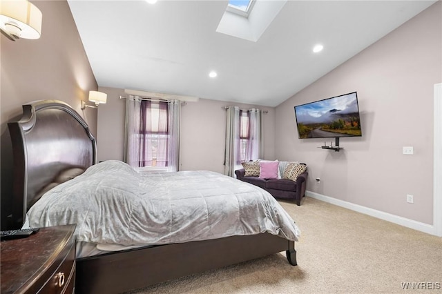 bedroom with lofted ceiling with skylight, recessed lighting, carpet flooring, and baseboards