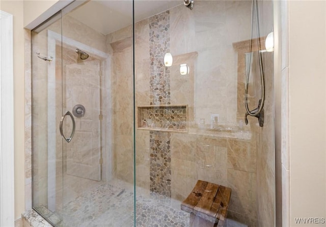 full bathroom featuring a stall shower